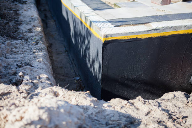 Professional Emergency Waterproofing technician working in Plymouth, PA